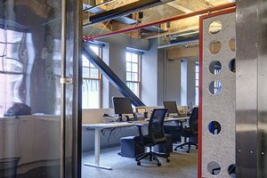 Preview of Payscale - Image 8: Indoors, Office, Desk, Furniture, Table, Steel door, Structure wood, Exposed duct.