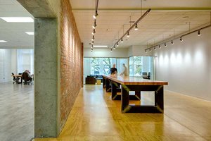 Preview of Gaming Lab - Image 3: historic, Flooring, Furniture, Table, Dining Table, Indoors, Interior Design, wood floor, plywood, glulam, steel table, brick.