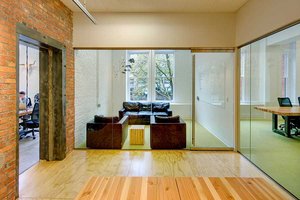 Preview of Gaming Lab - Image 6: historic, Flooring, Couch, Furniture, Indoors, Room, Hardwood, Wood, plywood, wood floor, brick, conference room, glass interior.