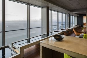 Preview of Zillow Executive Offices - Image 0: Furniture, Indoors, water feature, view, concrete, concrete counter, wood floor, grating.