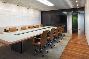 Preview of Zillow Executive Offices - Image 14: Conference Room, Indoors, Meeting Room, Room, Chair, Furniture, Dining Table, Table, Plywood, Wood, grating, wood floor, leather.