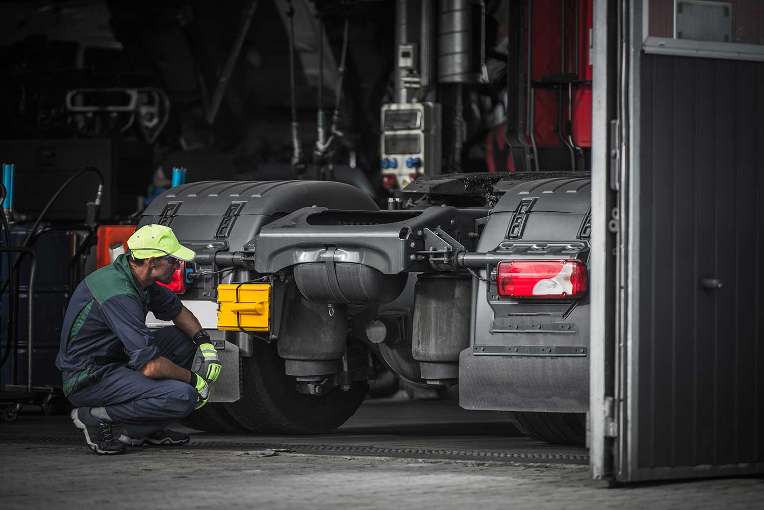 mechanic working on a truck.