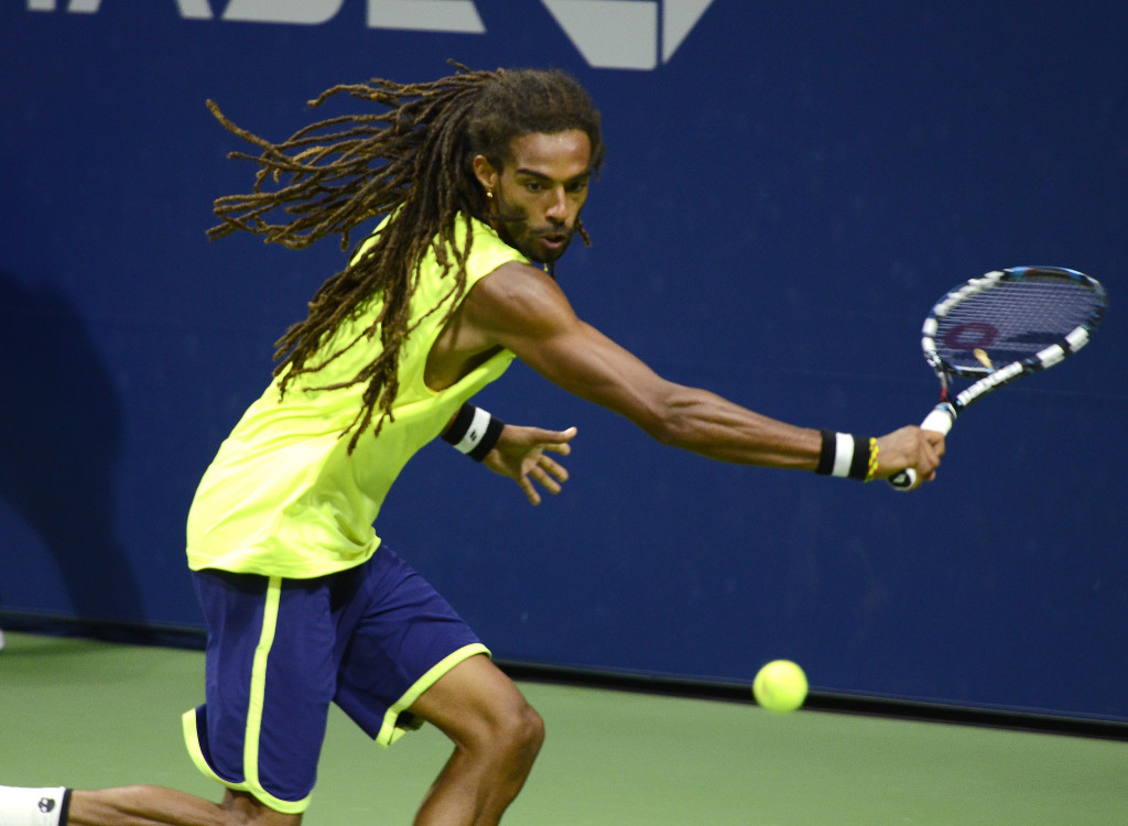 Action shot of Dennis Brown on the tennis court at the U.S. Open