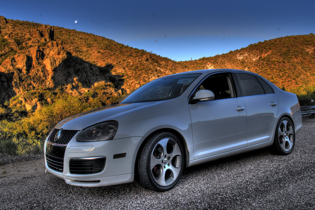 Volkswagon Jetta parked in the desert.