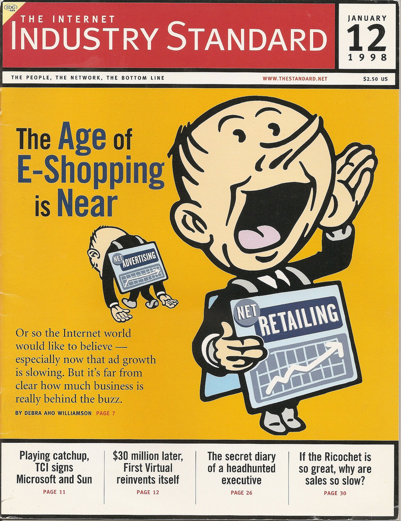 Cover of 1998 Internet Industry Standard journal showing a man announcing that "The Age of E-Shopping is Near."