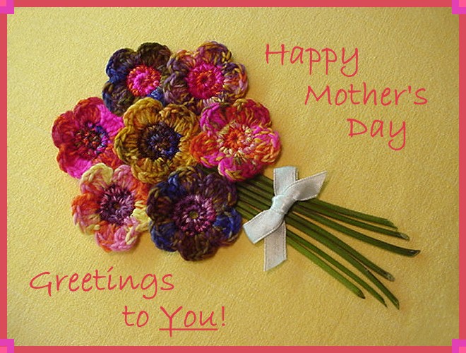 Greeting card that reads, &quot;Happy Mother's Day Greetings to You!&quot; Card has a bouquet of pink and purple crocheted flowers in the center.