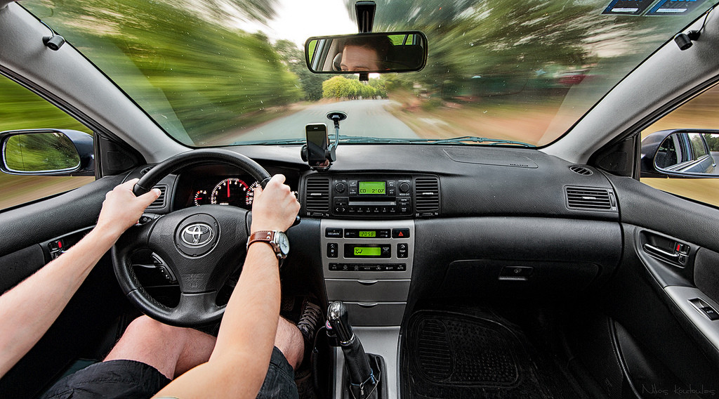 Interior view of the dashboard of a car.