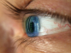 Eye looking at computer code