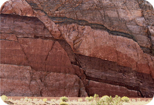 Rocks with jagged lines running through them