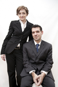 Woman and man wearing business attire