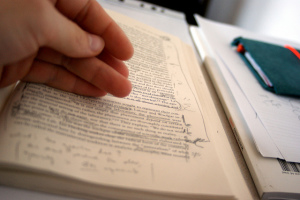 Book with handwritten notes in margins