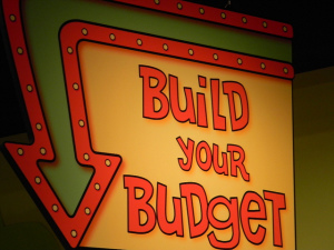 Sign reading "build your budget"