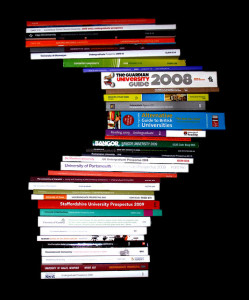 College catalogs stacked to form question mark