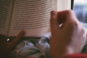 hand holding a book