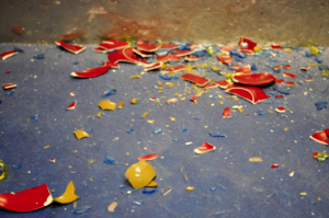 Shattered pottery strewn across the floor.