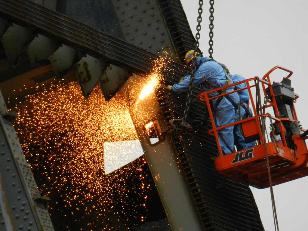 A construction worker welding