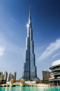 The photo shows the Burj Khalifa building from a distance.