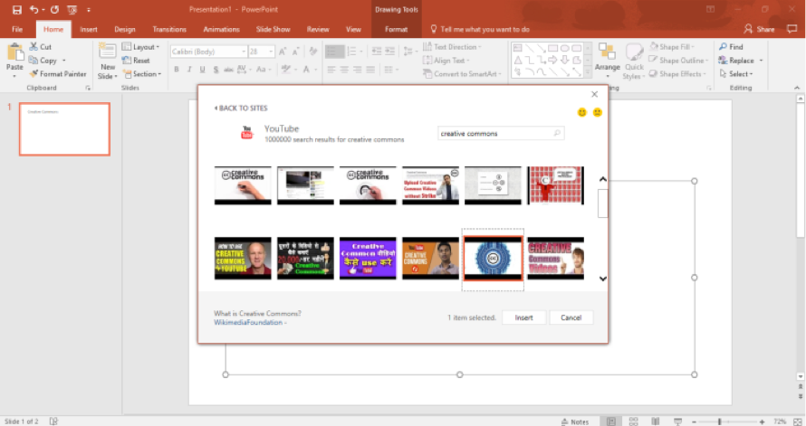 A Microsoft powerpoint is open. In the insert video dialog box results for creative commons videos are being displayed. 