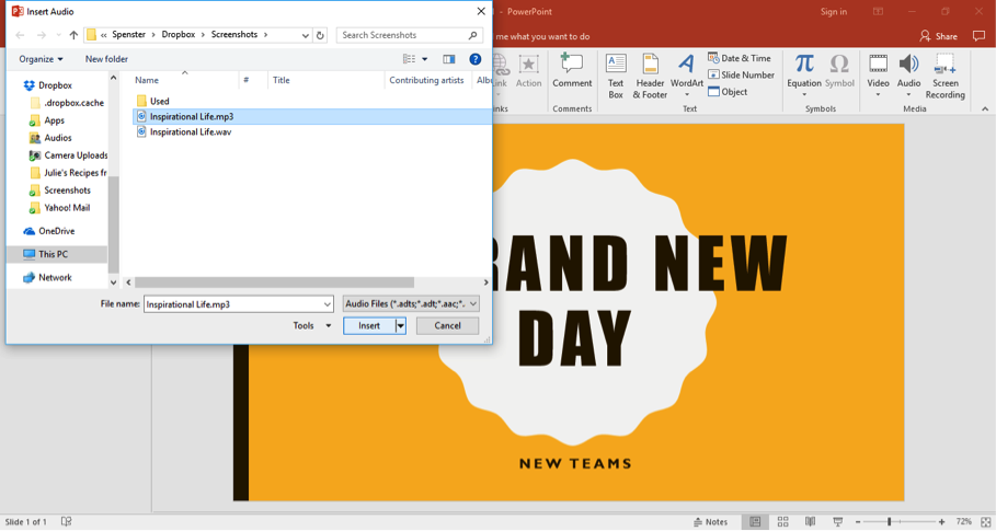 A Microsoft Powerpoint with the title "A Brand New Day" is open. An insert audio dialog box has opened and an audio clip has been selected from the computers files.