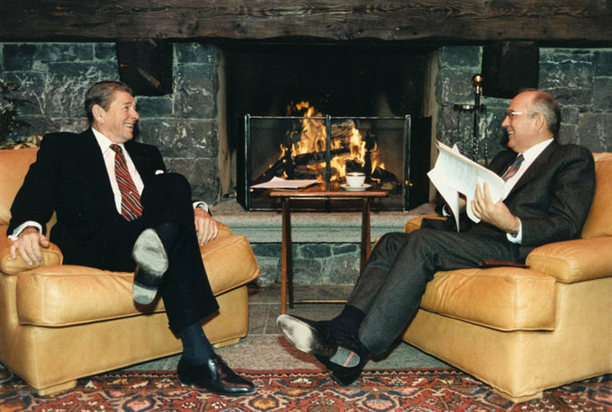 U.S. President Ronald Reagan and Soviet General Secretary Mikhail Gorbachov talking in front of a fireplace at the first Summit in Geneva, Switzerland.