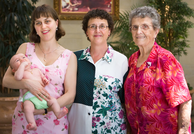 A picture of a baby, mother, grandmother, and great-grandmother.
