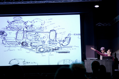 A narrative is projected on a screen at the VFS Digital Design Assembly.