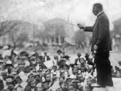 Booker T. Washington delivers the Atlanta Compromise speech.