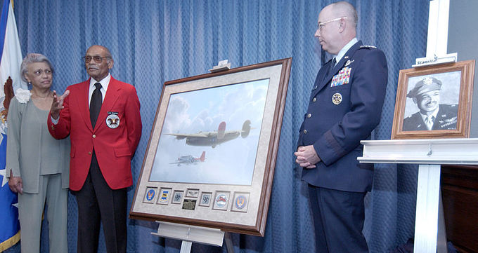 Members of a group speak during a Tuskegee Airmen presentation.
