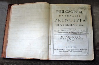 Isaac Newton's Principia, developed the first set of unified scientific laws