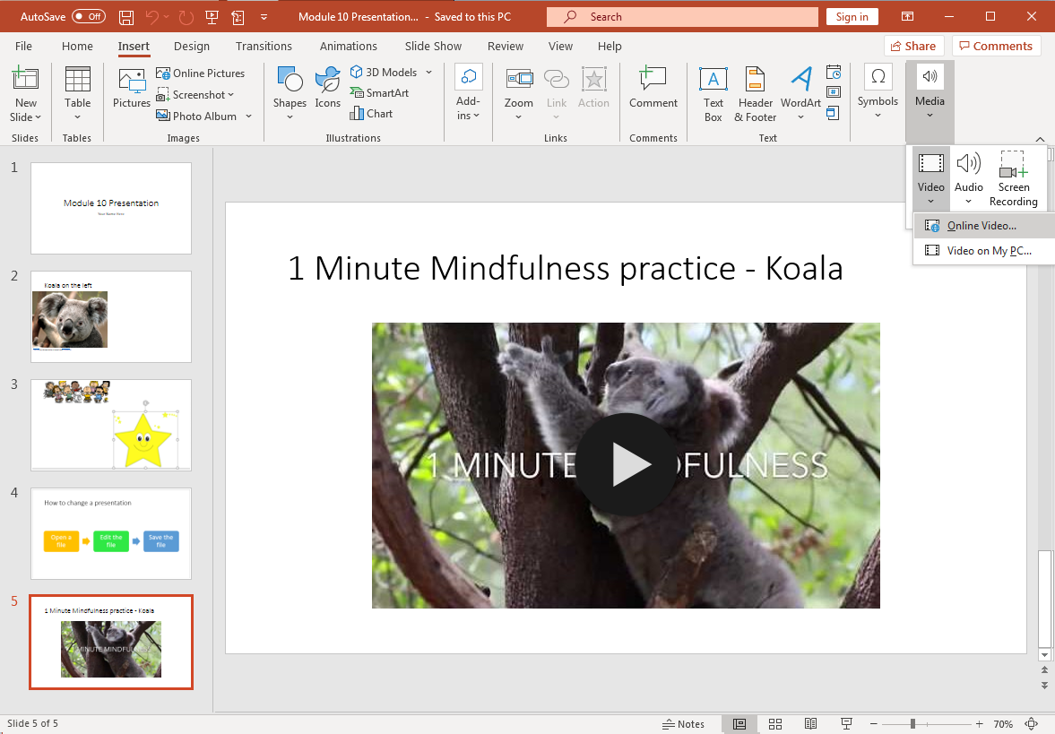 A Microsoft Powerpoint is open with 5 slides displayed. On the 5th slide is the title "1 Minute Mindfulness practice - Koala" and there is an embedded video. On the Insert tab of the ribbon, the options Media > Video > Online Video are selected.