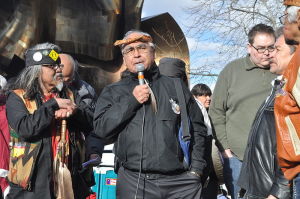 Speakers platform at raising of John T. Williams Memorial Totem Pole
