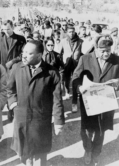 Martin Luther King, Jr. led the civil rights marchers from Selma to Montgomery, Alabama (credit: Rev. Ralph Abernathy walking with Dr. Martin Luther King, Jr., as they lead civil rights marchers out of camp to resume their march to Montgomery, Alabama, 1965. Prints and Photographs Division, Library of Congress. Reproduction Number LC-USZ62-111234. at http://www.americaslibrary.gov /jb/modern/ jb_modern_selma_3_e.html)