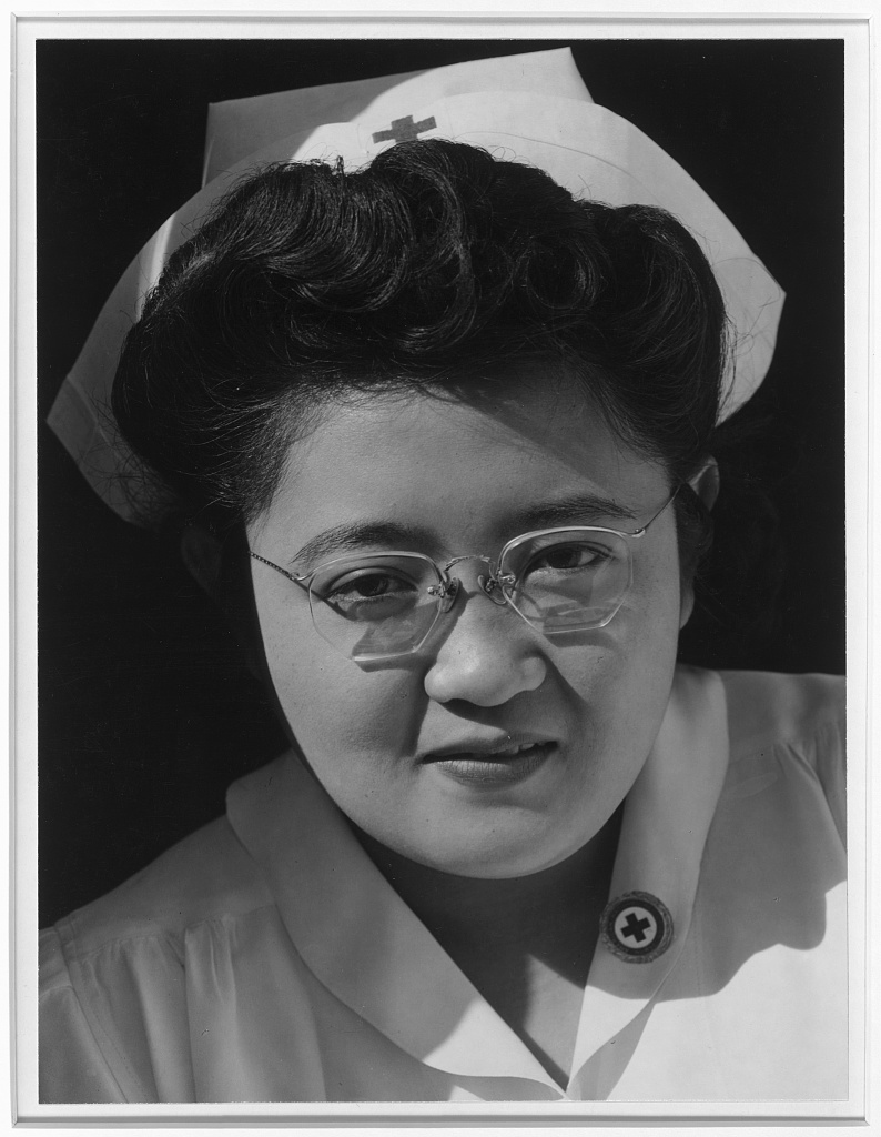 Catherine Natsuko Yamaguchi, Red Cross instructor, Manzanar Relocation Center, Cal. / photograph by Ansel Adams.Adams, Ansel, 1902- Manzanar War Relocation Center photographs; Repository Library of Congress Prints and Photographs Division Washington, D.C. 20540 USA at https://www.loc.gov/item/2001704616.