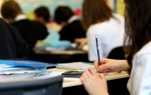 A student working at a desk.