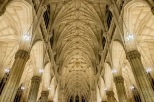 The pillars on the inside of a cathedral.