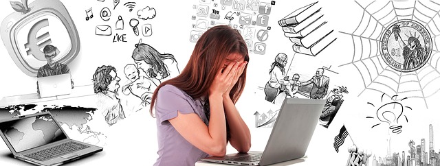 woman studying at a computer with her head in her hands as all sorts of thoughts appear around her head