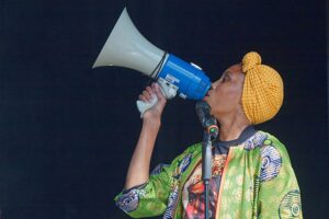 Woman talking into a megaphone