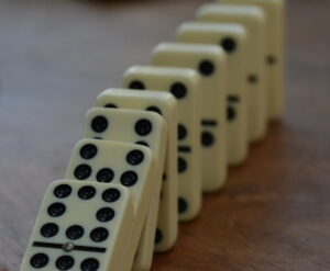 Close-up photo of dominoes falling