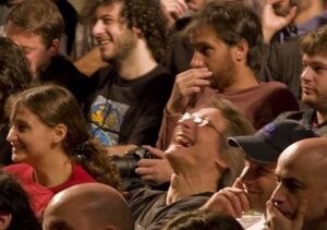 Photo of an audience laughing