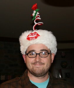 A man wearing a silly hat