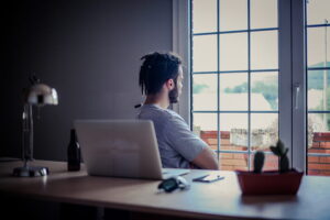 A man looking out the window