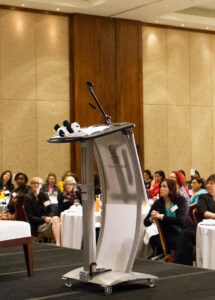 An empty podium at an executive luncheon