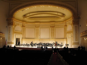 A concert hall with a piano onstage