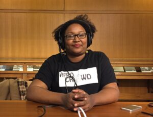 A woman wearing a headset with a microphone