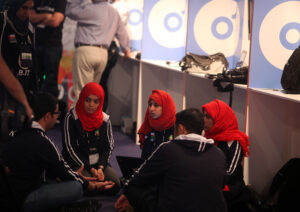 A group of young people sitting in a circle