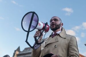 Man speaking into a megaphone