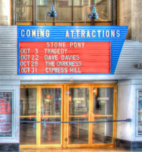 Sign previewing coming attractions