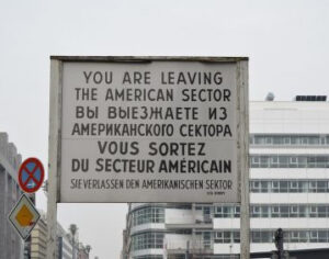 Sign reading You are leaving the American Sector