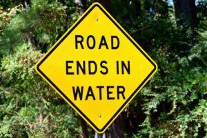 Sign says Road Ends in Water