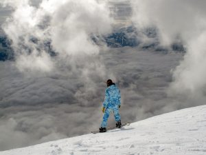 A snowboarder on the slopes.